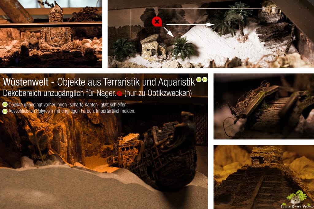 Viel Sand, eine Pyramide, ein sinkendes Schiff, Buddha-Figur, Brücke und kleine Miniaturhäuser und Palmen hinter Acrylglas